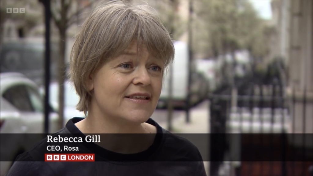 A photo of a white woman, Rosa's CEO Rebecca Gill, speaking on camera to BBC London news.